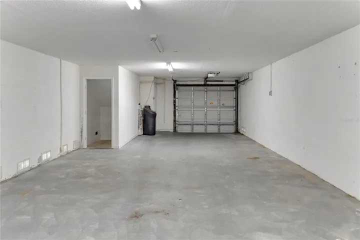 Rare 2-car garage with storage closet-ideal for beach gear, bikes, and storage.