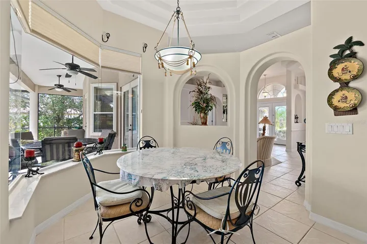 Cozy breakfast nook with a great pool & canal view!