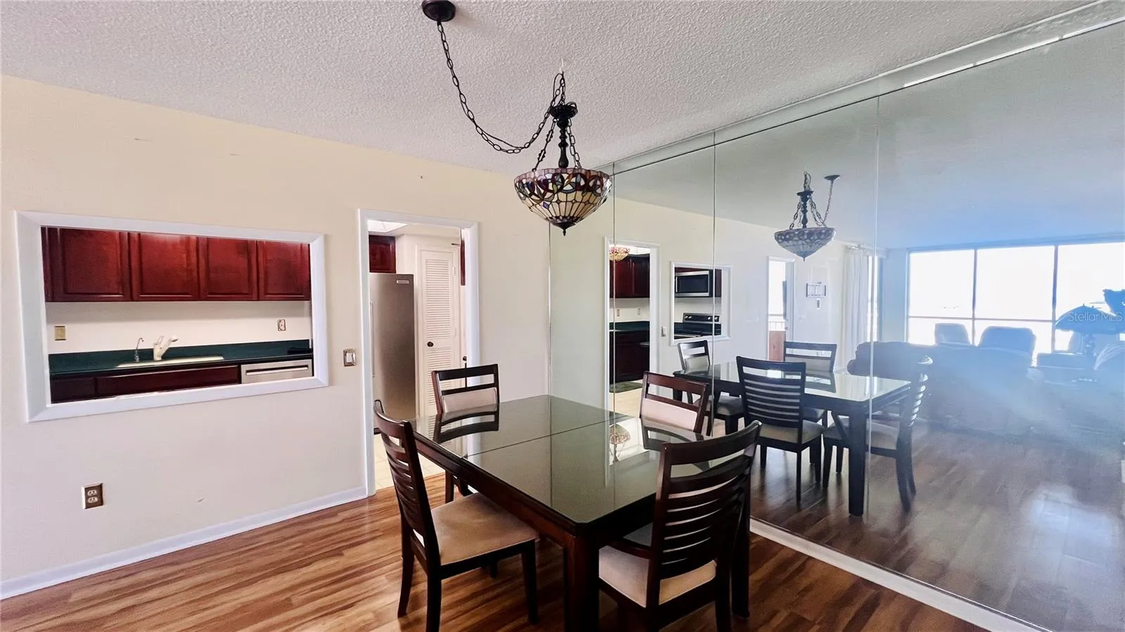 Dining Area with mirrored wall