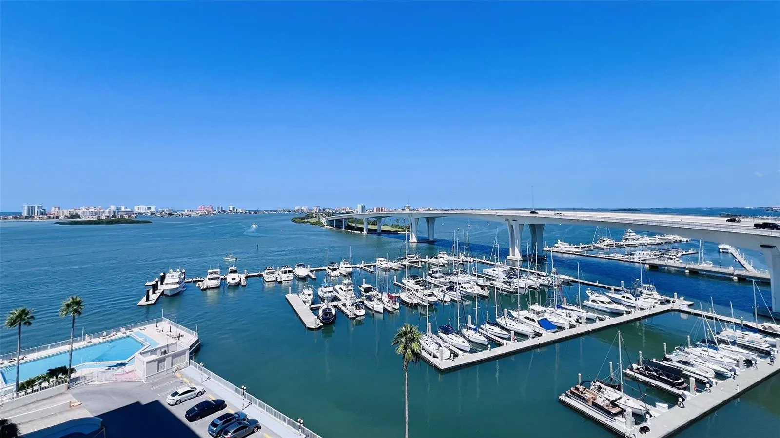 VIEW OF THE MARINA AND POOL FROM THE BALCONY
