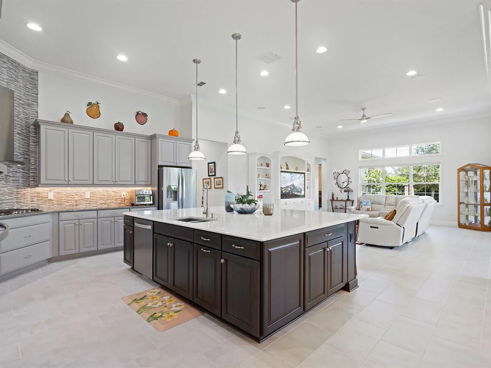 kitchen and island overlooking family/living space