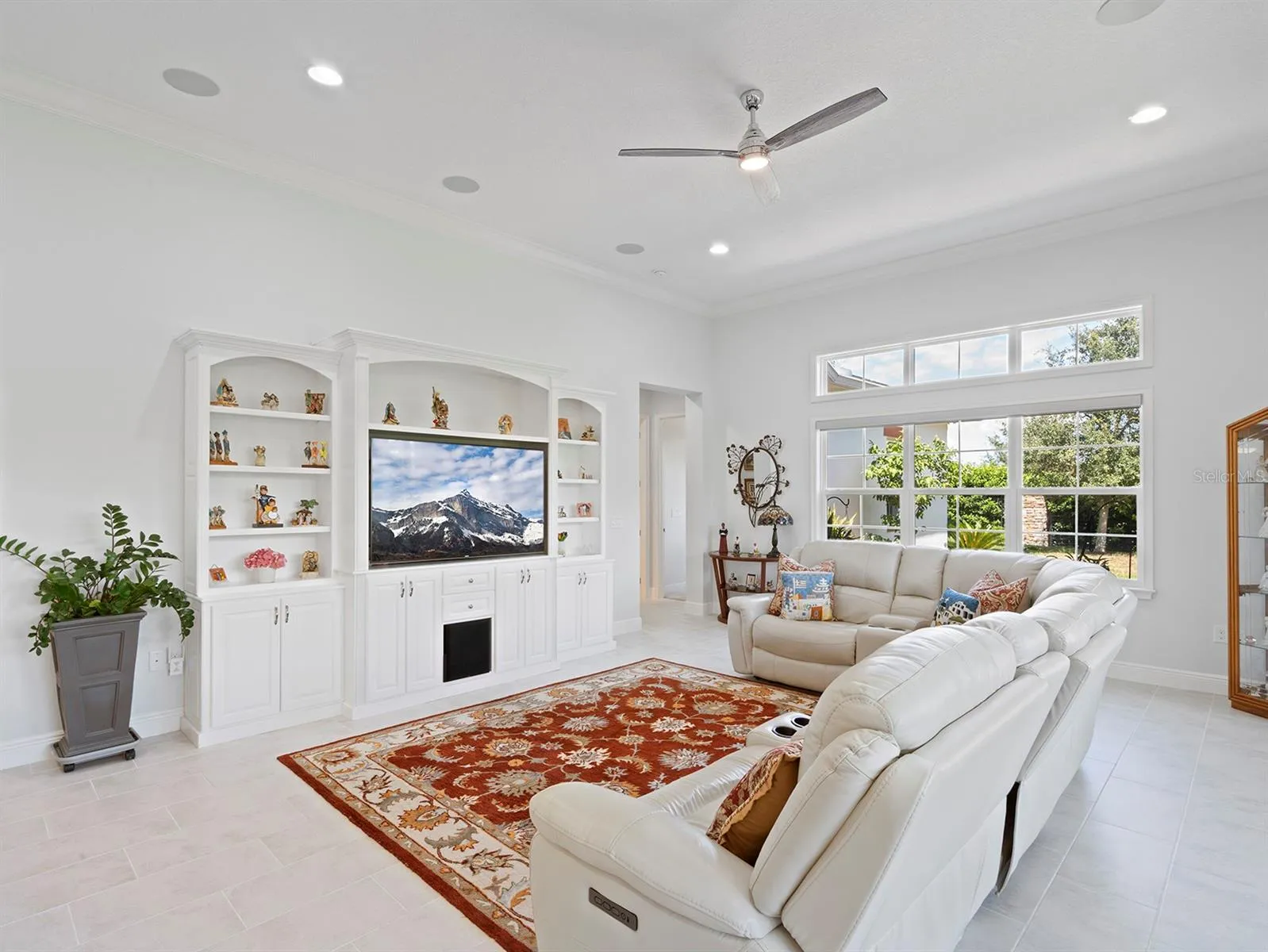 built-in entertainment center stays with home