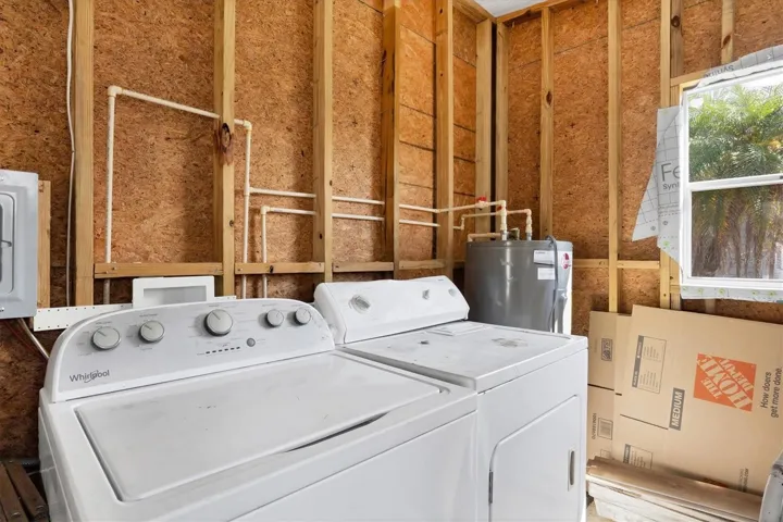 W/D enclosed in a Large Storage Area.