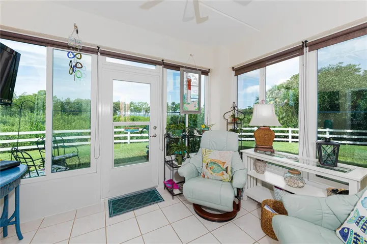 Enclosed porch with preserve view