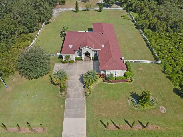 Mediterranean inspired residence set on expansive grounds. Welcome to 2105 S Avon Estates Blvd!