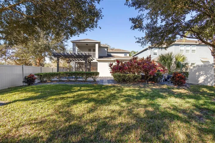 Large, fenced, backyard for a pool