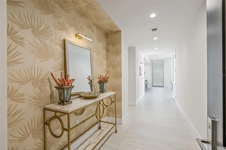 Enter the largest residence at Saltaire, offering a direct view of Tampa Bay from the Open concept living area!