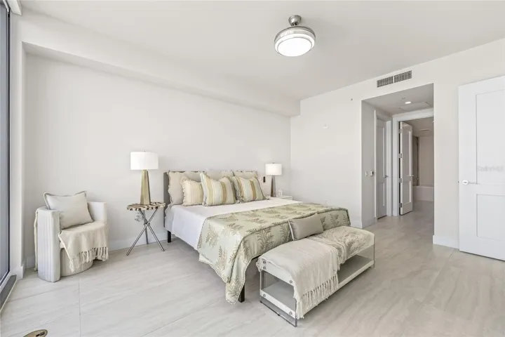 The generously sized primary bedroom features dual walk-in closets in the primary suite with a spa-like primary bathroom.