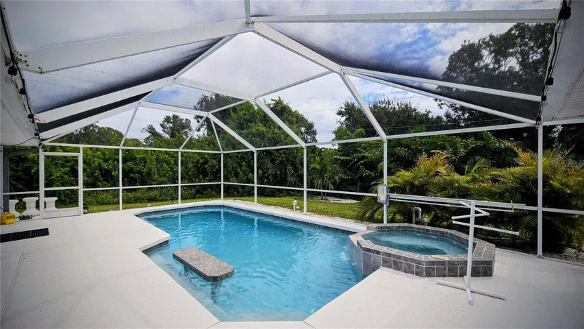 Screened enclosed heated pool and jacuzzi