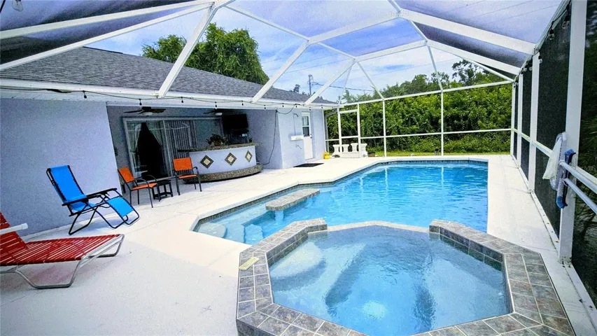 Screened enclosed heated pool and jacuzzi