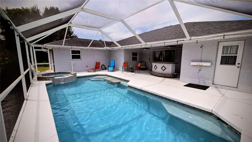 Screened enclosed heated pool and jacuzzi
