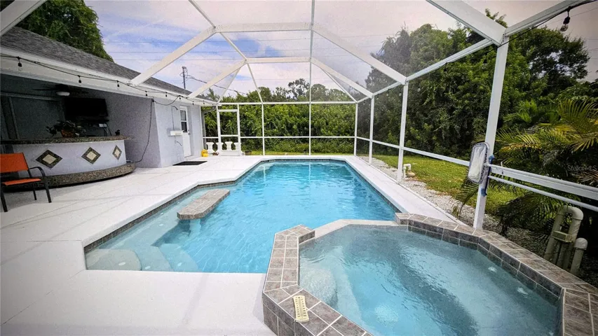 Screened enclosed heated pool and jacuzzi