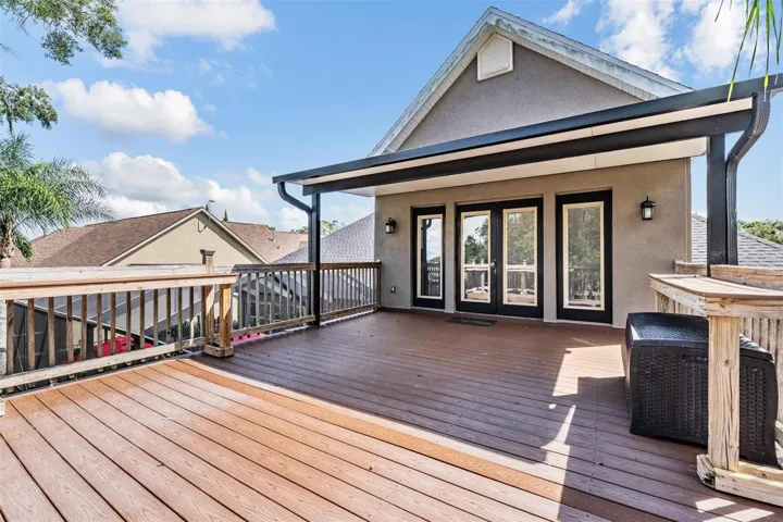 Newer Trex flooring on upstairs balcony for the bonus/game room
