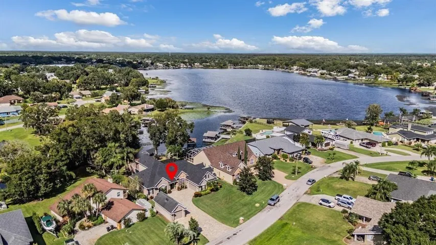House is on East Lake within Lake Padgette Estates - 3 total lakes, parks, boat ramps, picnic shelters, playgrounds, and more availabe to owners
