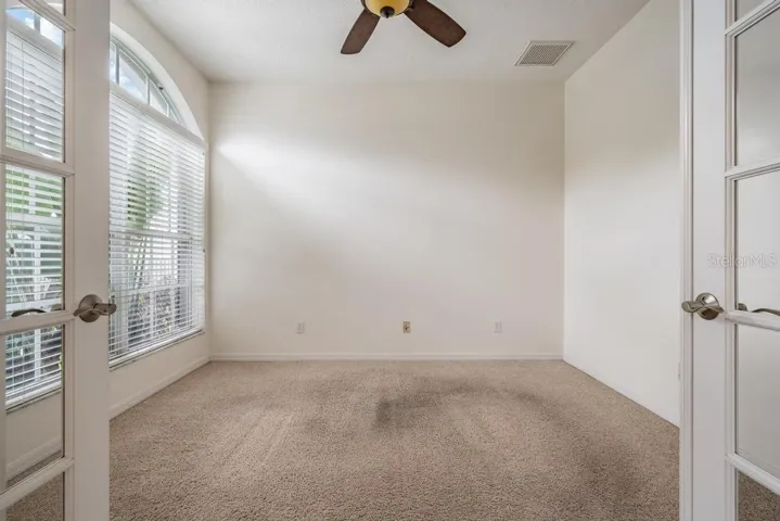 Office, located towards front door, with closet