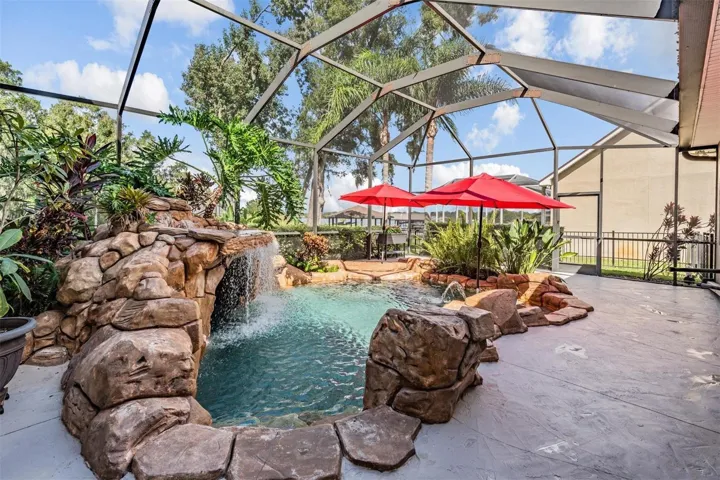 Gas heated pool & spa with waterfall, fiber optics, self cleaning system