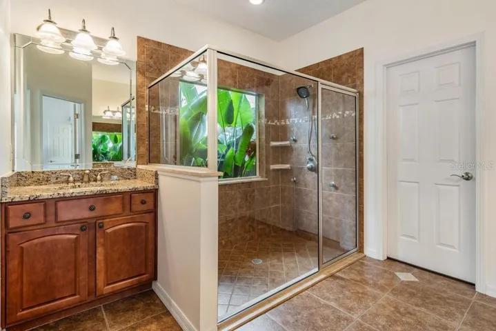 Primary bath, shower with 4 wall jets and shower head
