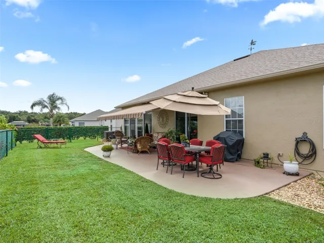 Fenced in yard with 2 gates