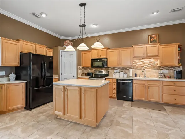 Kitchen with Solid surface counters