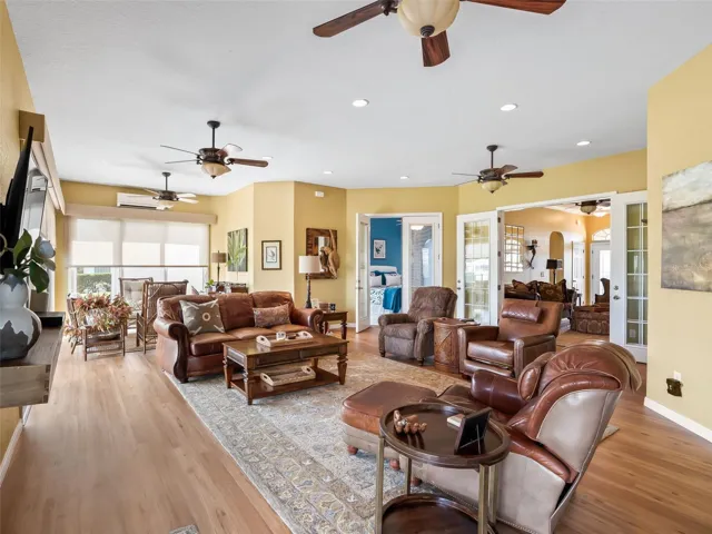 GREAT room  with views of the yard and walking trails