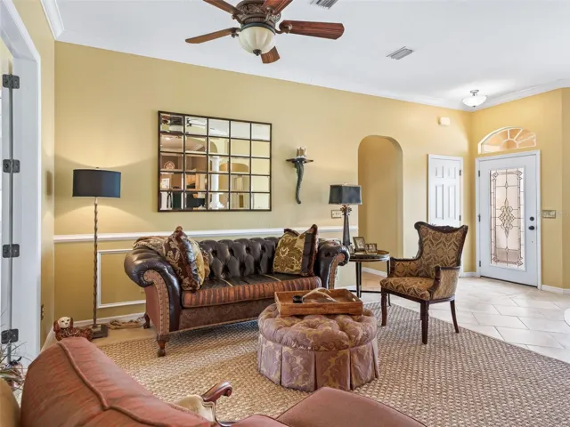 gathering room, shows front door with a closet