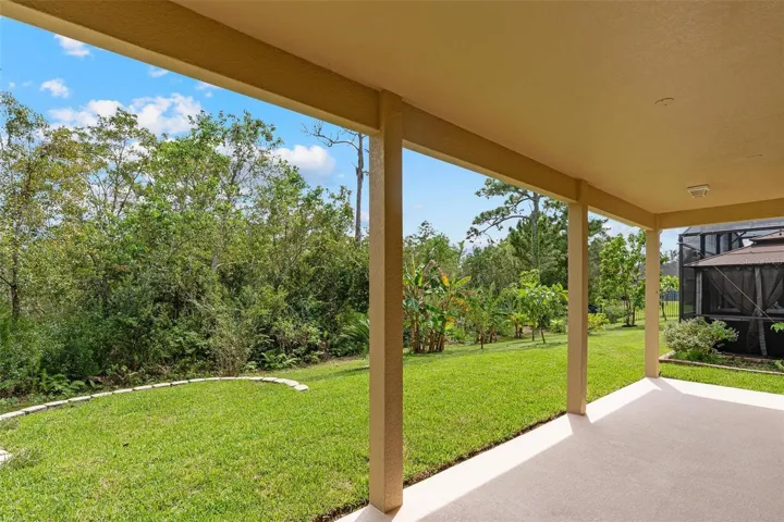 The covered lanai is your ideal oasis to escape to after a long day and enjoy your favorite libation.