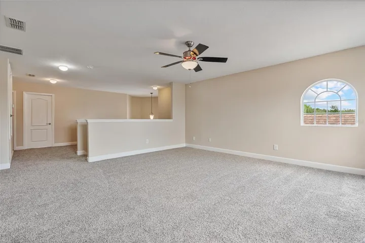 The second floor bonus room features a built in closet and is the ideal flex space for a home theatre or gym, game room or a 6th bedroom.