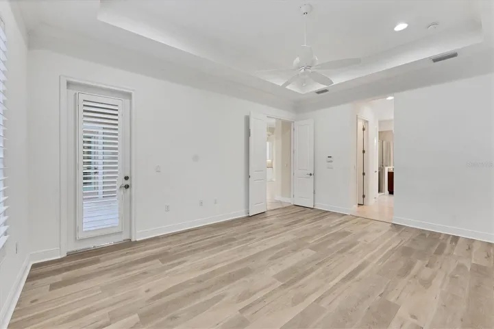 Primary Bedroom Features Door to Lani