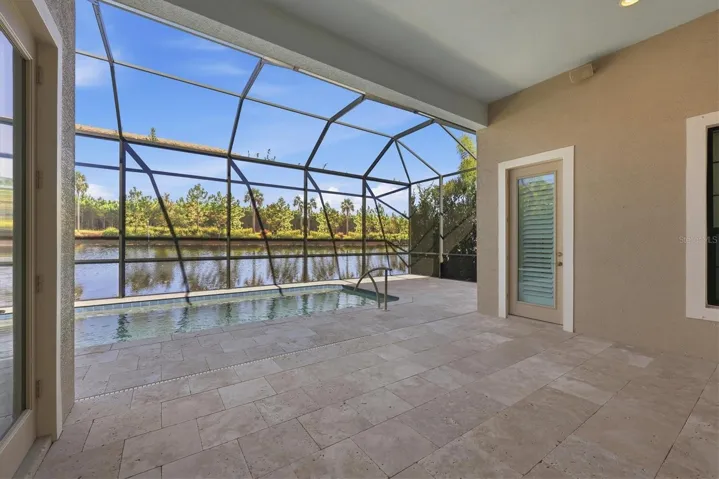 Coral Stone Paver Lanai & Custom Mural Pool Screen