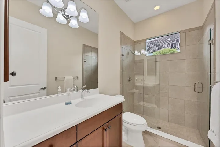Guest Bath with Frameless Glass Shower Door
