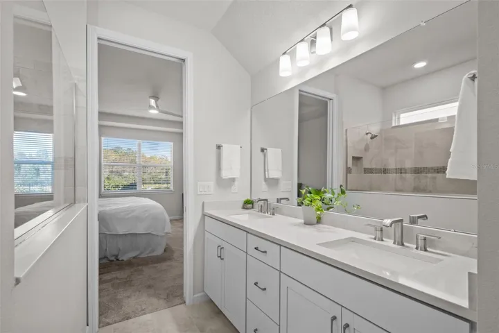 Primary BathroomSpa-like primary bathroom with dual vanities, a large shower, and a comfortable owner’s suite layout.