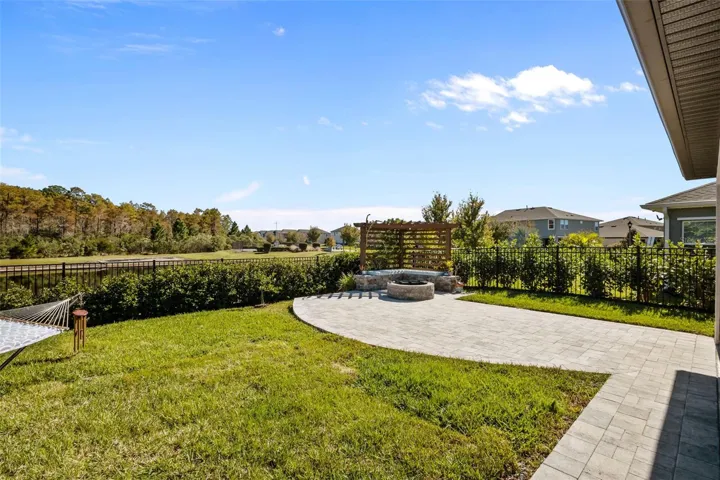 BackyardFenced backyard with room to relax, play, and enjoy the natural setting. Also plenty of room for a pool