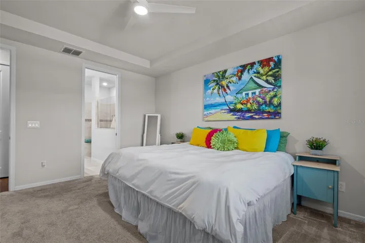 Primary BedroomFirst-floor primary suite with tray ceilings and a private retreat feel.