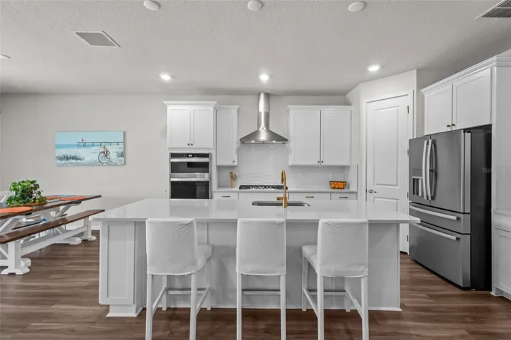 KitchenThe open-concept kitchen features built-in appliances, a natural gas cooktop, and a functional layout for everyday living.
