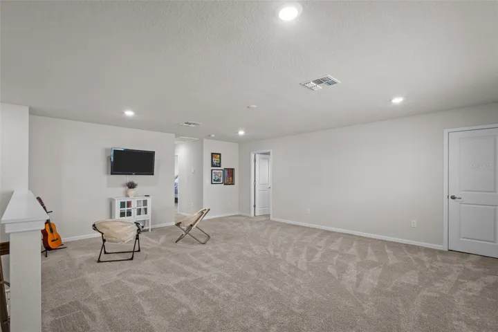 LoftMassive upstairs loft offers the perfect second living area, media room, playroom, or game space.