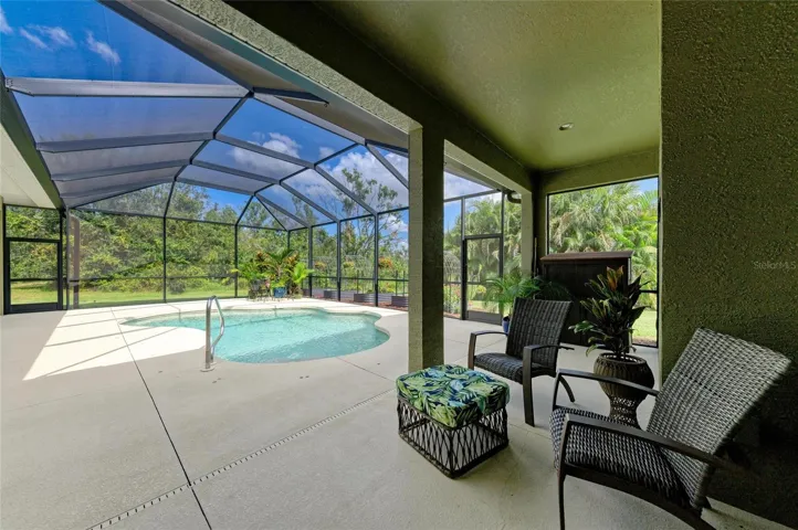 Heated Pool with Sliders to Family Room