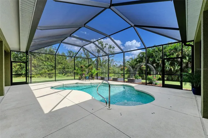 Heated Pool with Sliders to Family Room