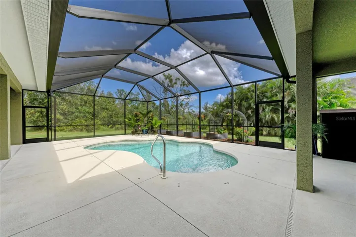 Heated Pool with Sliders to Family Room