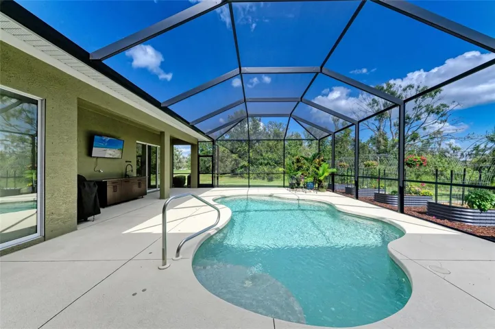 Heated Pool with Sliders to Family Room