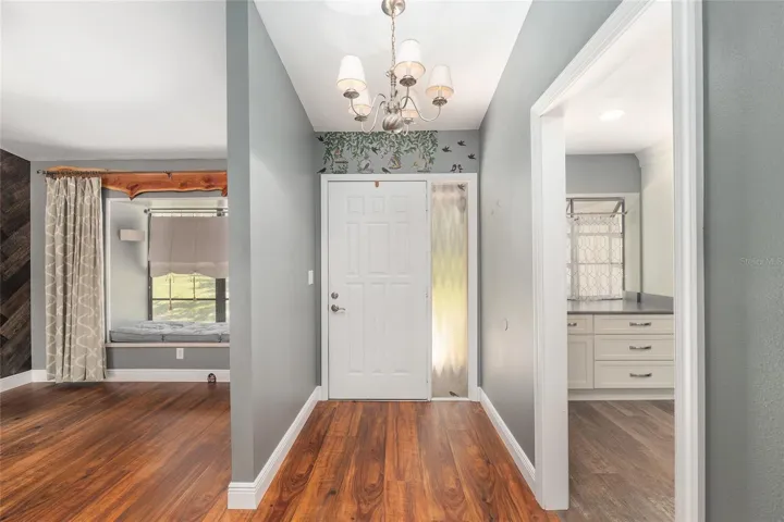 Dining Room, Front door and Kitchen view
