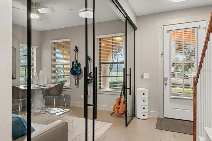 First floor guest room/office/den with sound proof doors