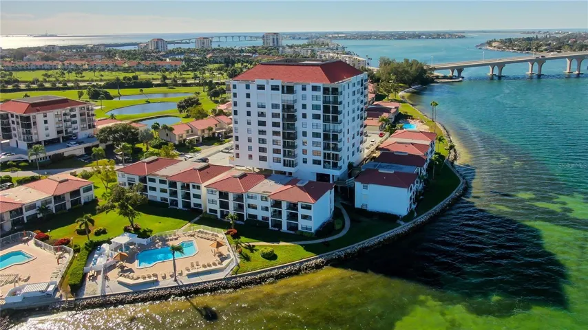 Located right on Boca Ciega Bay on an Island with the Isla Del Sol Country Club golf course running through it
