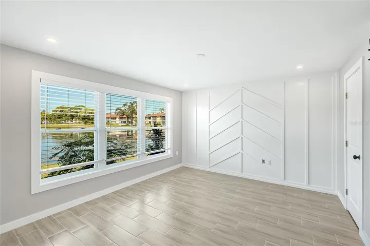 Primary Bedroom with feature wall.