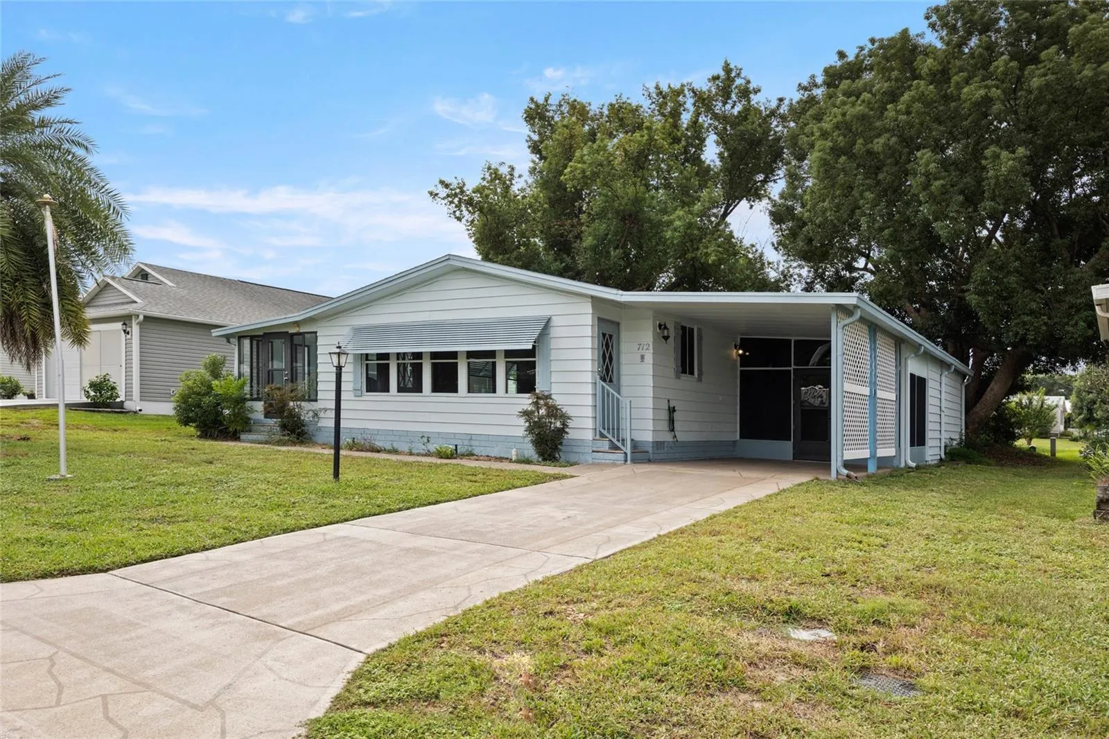 The Front Of The Home &amp; Attached Carport