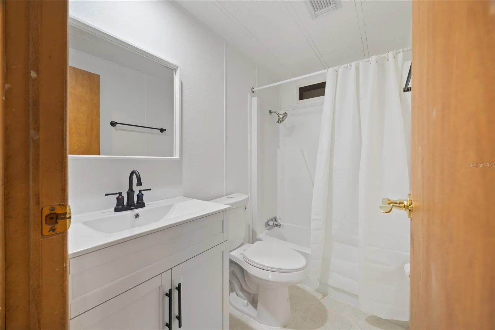 Remodeled Tiled Guest Bathroom