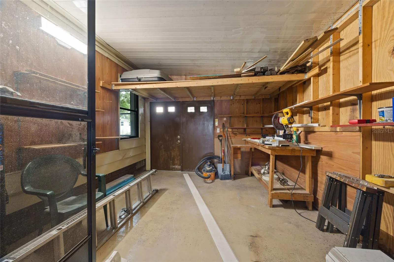 Golf Cart Garage With A Workspace For Your Outside Projects