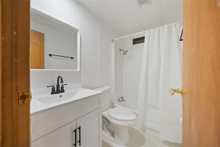 Remodeled Tiled Guest Bathroom