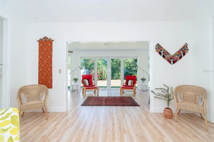 Impact-resistant windows and doors span the back of the home