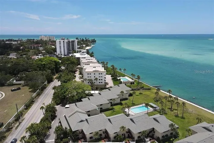 Located just moments from Siesta Key Village and world-famous Siesta Beach,  this updated second-floor retreat places you in the heart of island life.