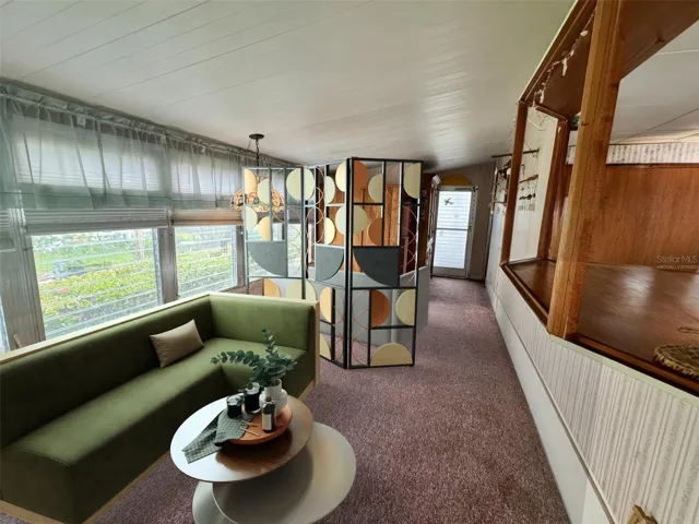 Virtually Staged-Need an extra bed?  Reconfigure the large family room